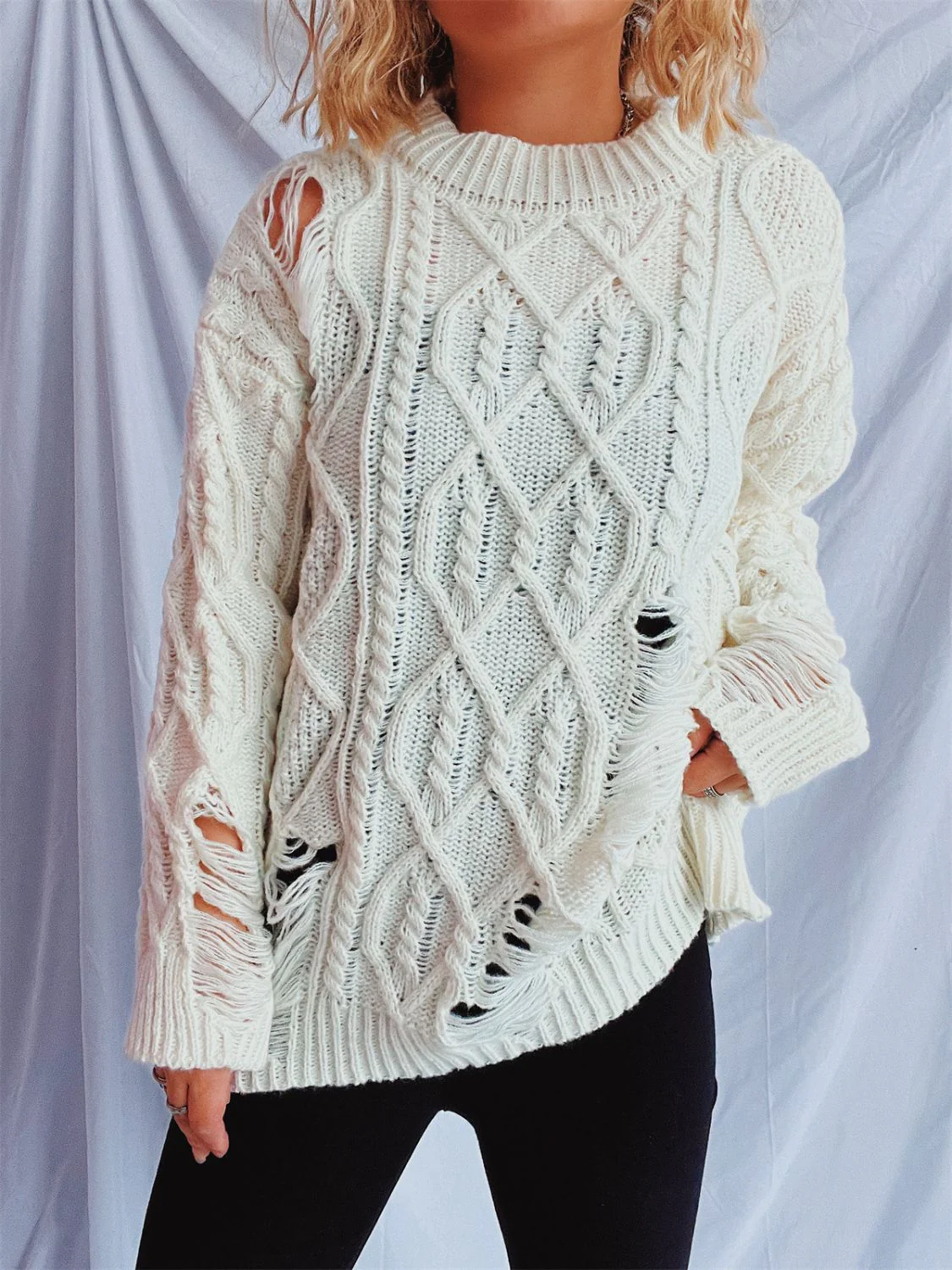 Clara | Long-sleeved, crew-neck, distressed cable-knit sweater - Image 7